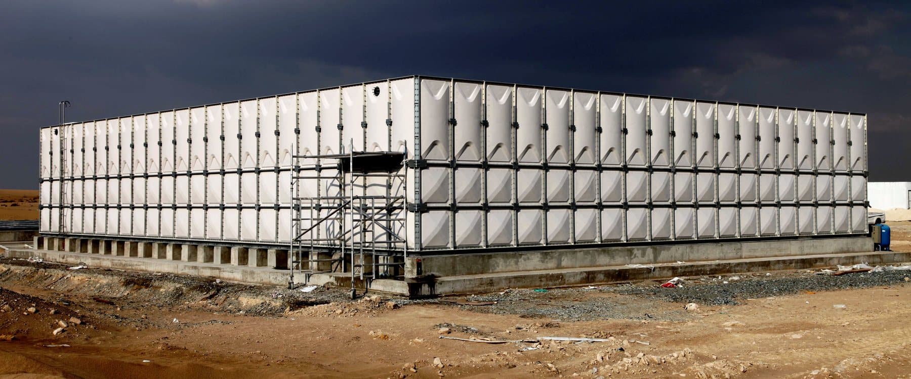 Large modular panel tank installed on an open project site