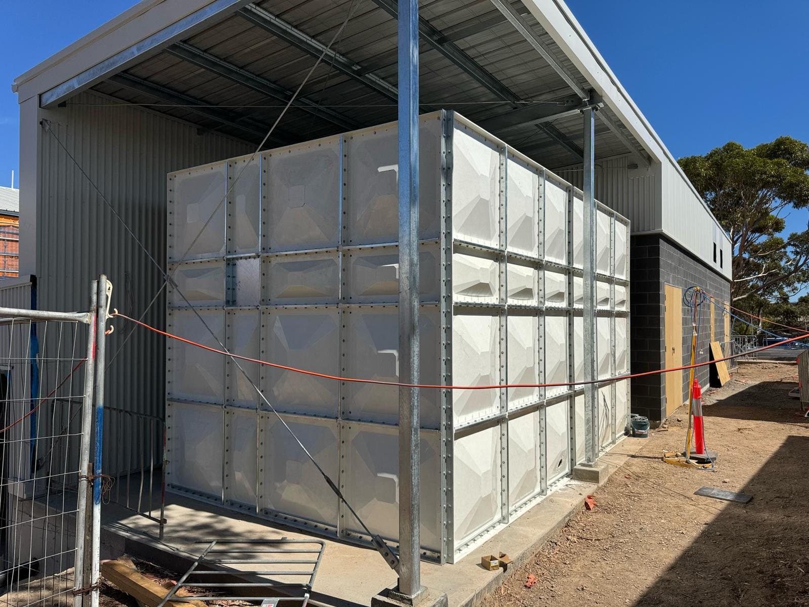 Installed sectional GRP panel tank representative of fire water storage projects